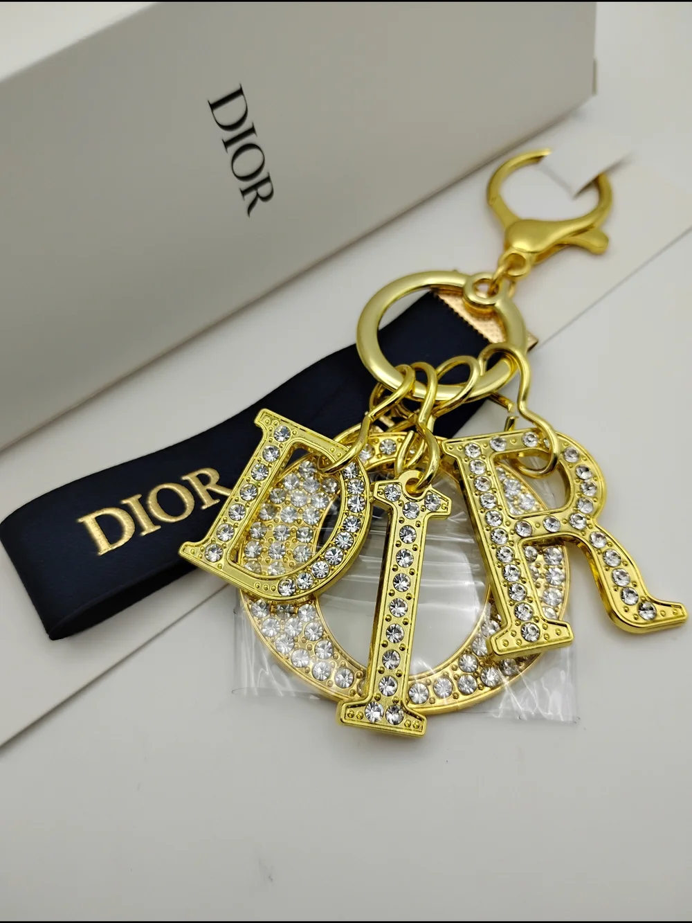 Dior Gold Crystal 'D I O R' Logo Keychain with Black Ribbon BNIB